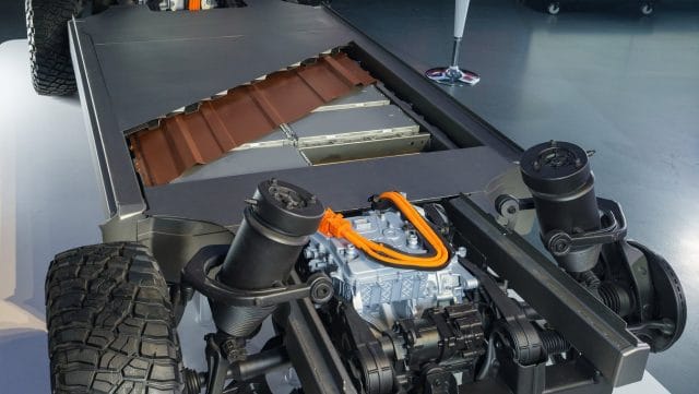 GM and Ford need electric car batteries, but they have different plans